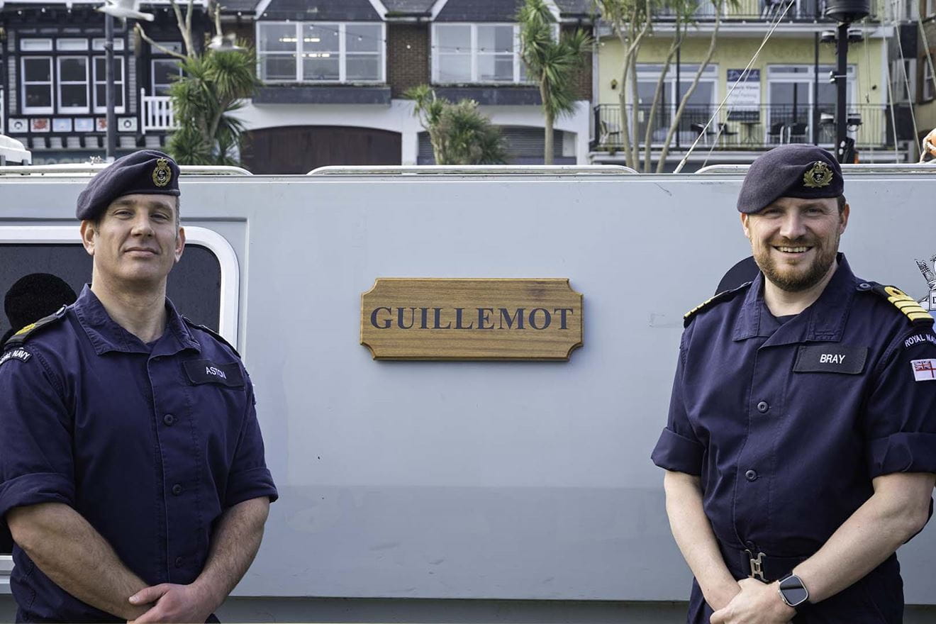 River Officer WO1 Rattenbury (left) and CO BRNC Captain Andy Bray on the newly-renamed Guillemot