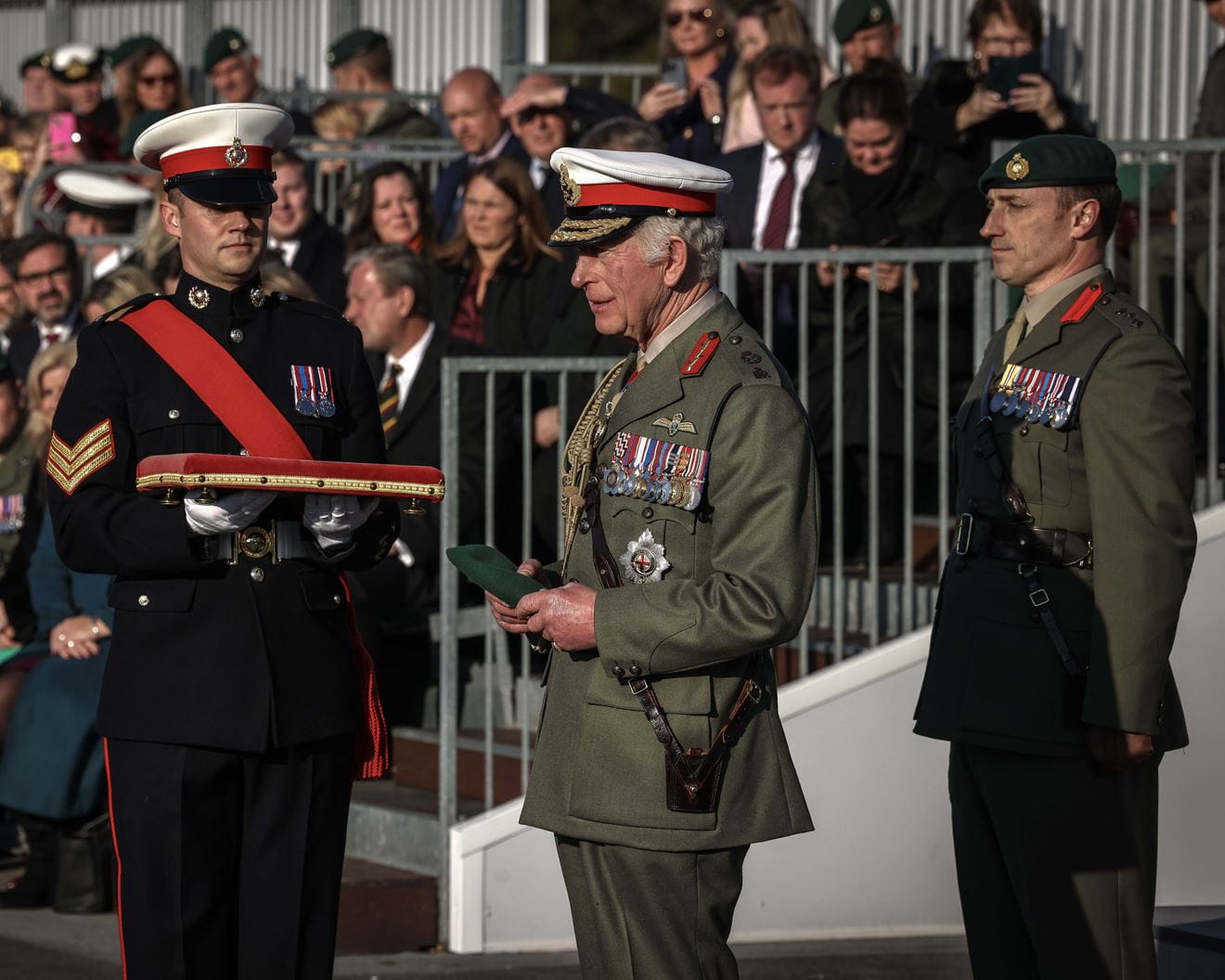 His Majesty the King, inspected the Kings Squad of the Royal Marine Commandos and presented the ranks with their hard earned green berets.