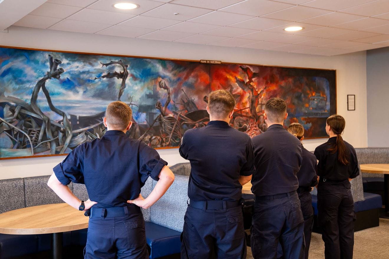 Raleigh trainees admire the large artwork.