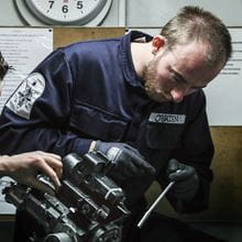 A Royal Navy engineer at work