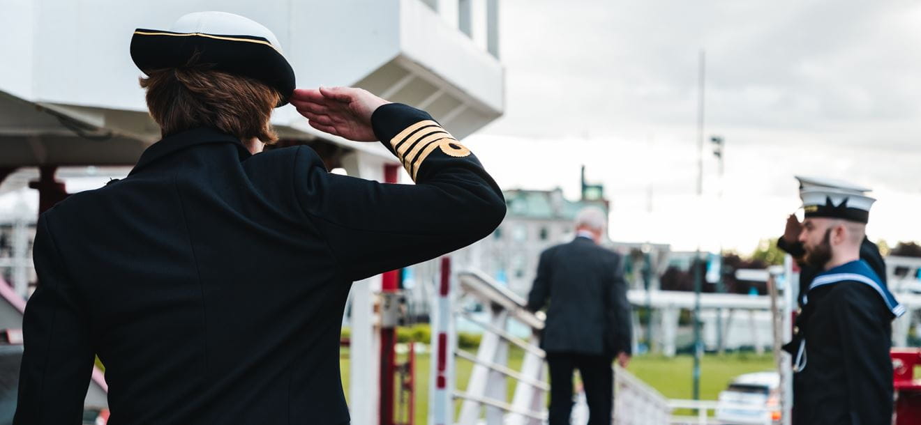 The Commanding Officer of HMS Protector Captain salutes the Lieutenant Governor of Quebec