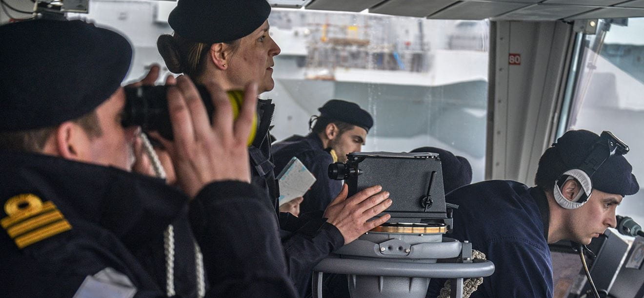 Pictured are HMS Defender's crew as the ship has arrived back into Portsmouth after her first time back at sea following an 18-month refit.