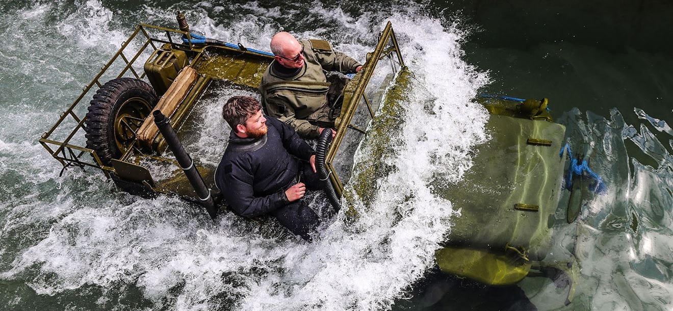 WW2 Willys jeep going through the dip tank, fording to a depth of 1.5m