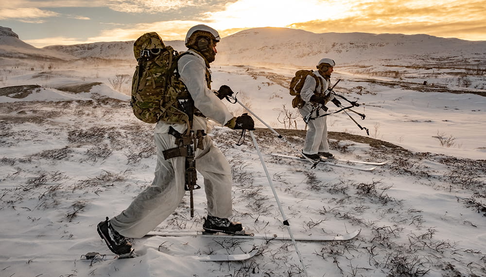 Royal-Navy-Our-People-Duty-and-Commitment-02-thriving.jpg Two Royal Marines on cross-country skis in Norway