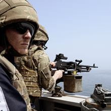 Royal-Navy-Our-People-Our-Values-05-courage.jpg Royal Navy sailors man the guns onboard HMS Duncan
