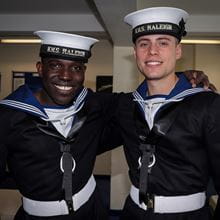 Royal-Navy-Our-People-Our-Values-10-loyalty.jpg Two HMS Raleigh recruits smile at the camera