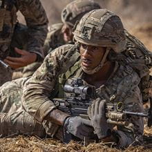 Royal-Navy-Our-People-Our-Values-12-integrity.jpg Royal Marine with gun in live firing range