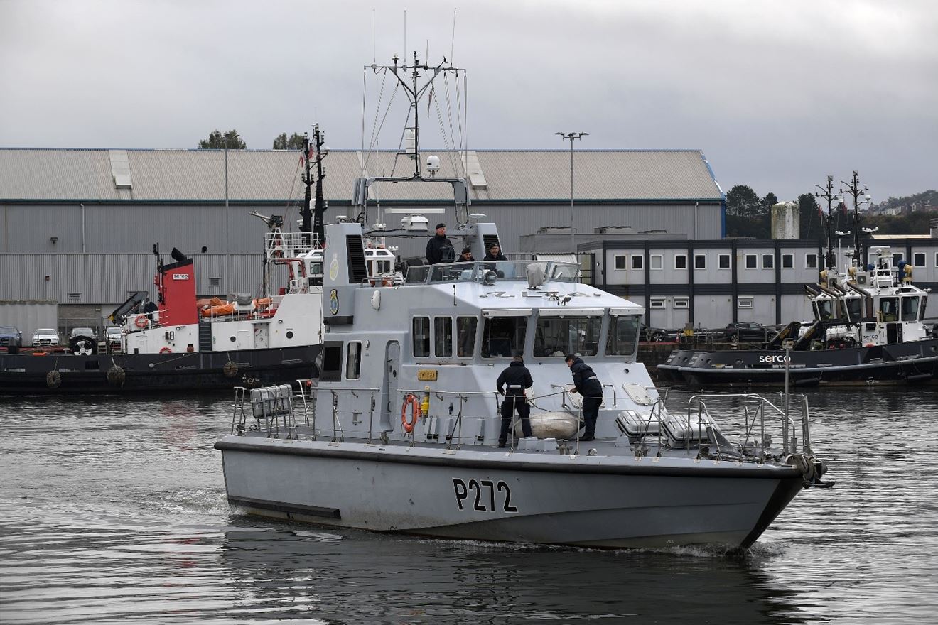 4.	FOST Official Photographer, HMNB(D), BOST WK 44/22. HMS SMITER exiting 4 Basin for the Hamoaze