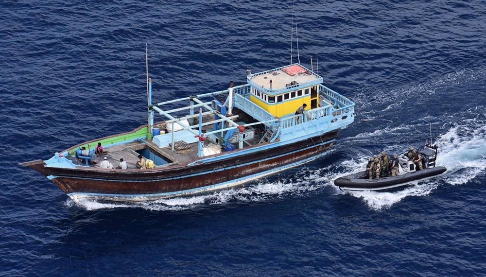 Royal Navy rib approaches a boat suspected of drug smuggling