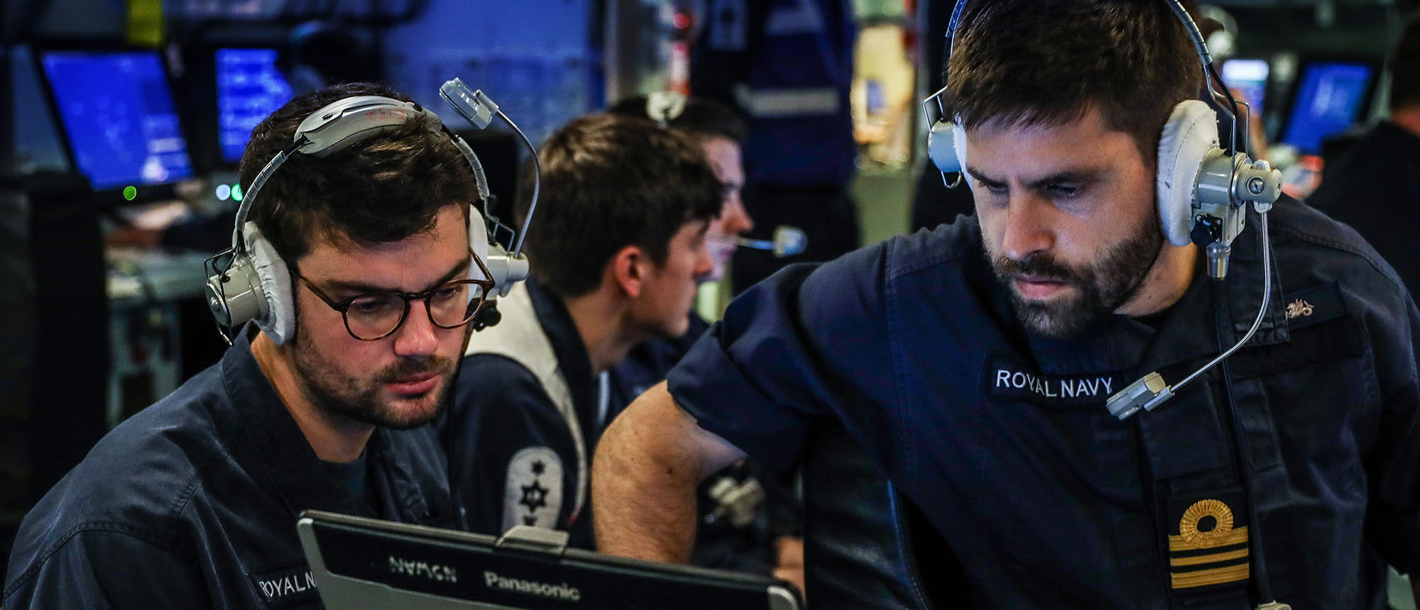Navy personnel working in the operations room of the Type 45 destroyer HMS Dragon during Exercise Formidable Shield.