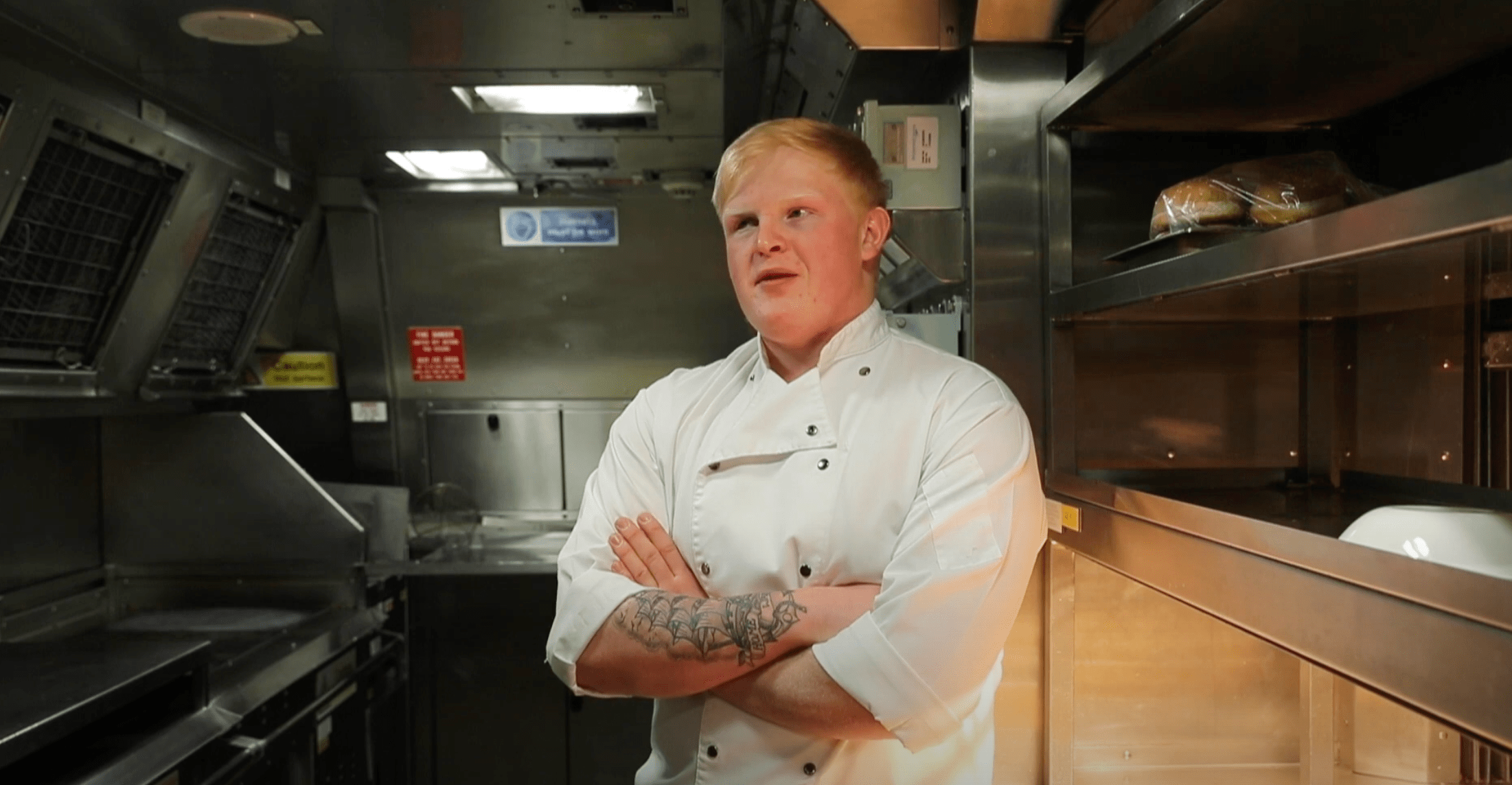 A ROyal Navy Submariner caterer in the galley talking about life in the Navy
