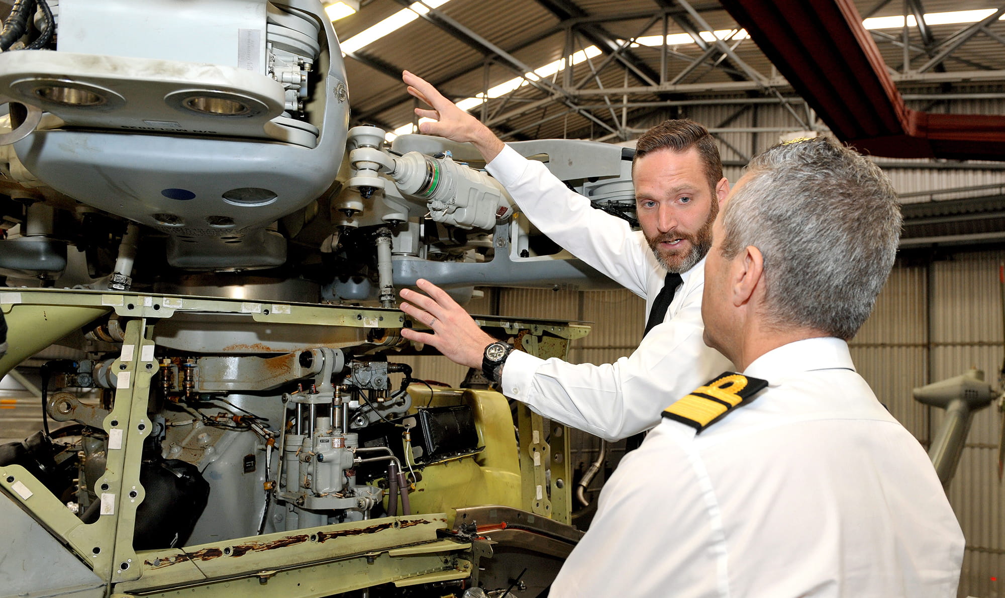 Rear Admiral Blount took time out to talk to CPO Tregenza about his GEMS award and was shown how it works