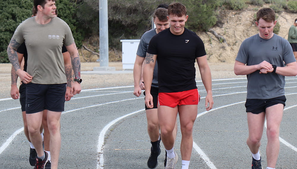 Picture shows Royal Marines running. Sport is a central part of life as a Royal Marine. It contributes to your ongoing fitness, keeping you in peak condition to cope with the rigours of everyday life.