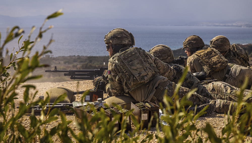 royal-navy-careers-services-08 Royal marines train with the army in Cyprus. Marines from 45 Commando fire support group with the general purpose machine gun.