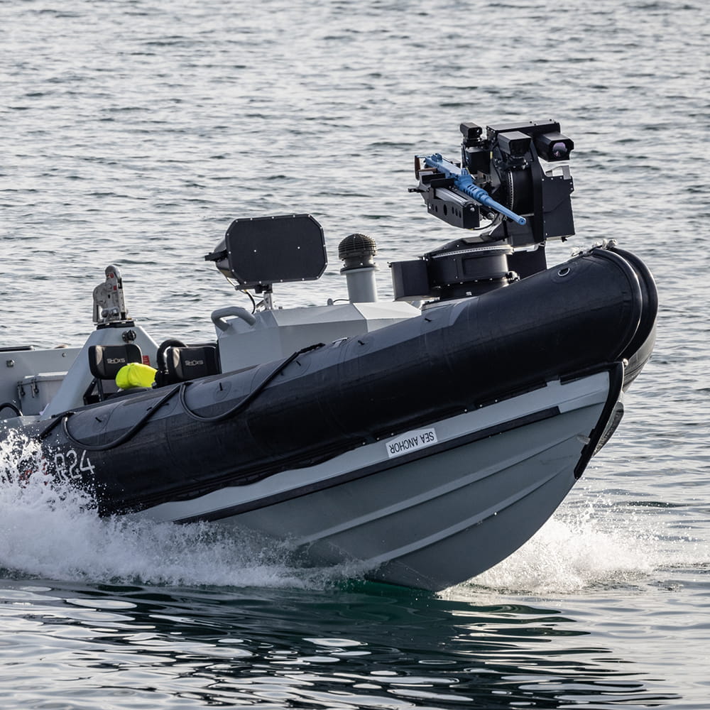 Uncrewed Pacific 24 being controlled remotely by HMS Argyll