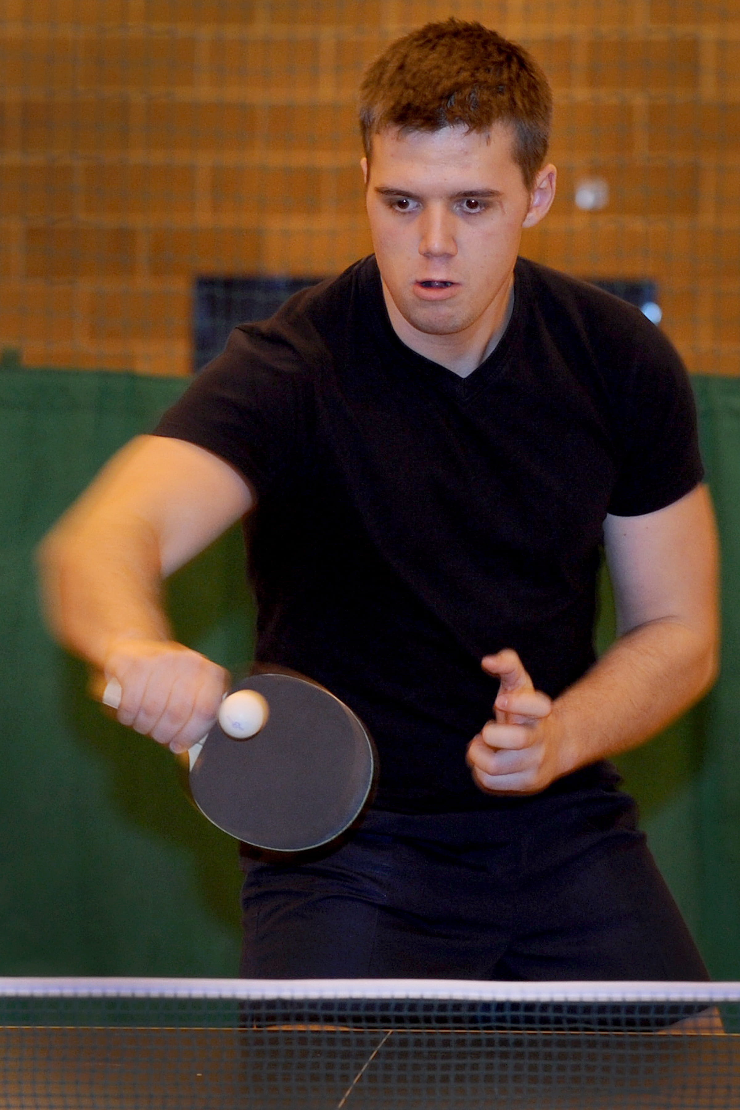 Someone playing Table Tennis 