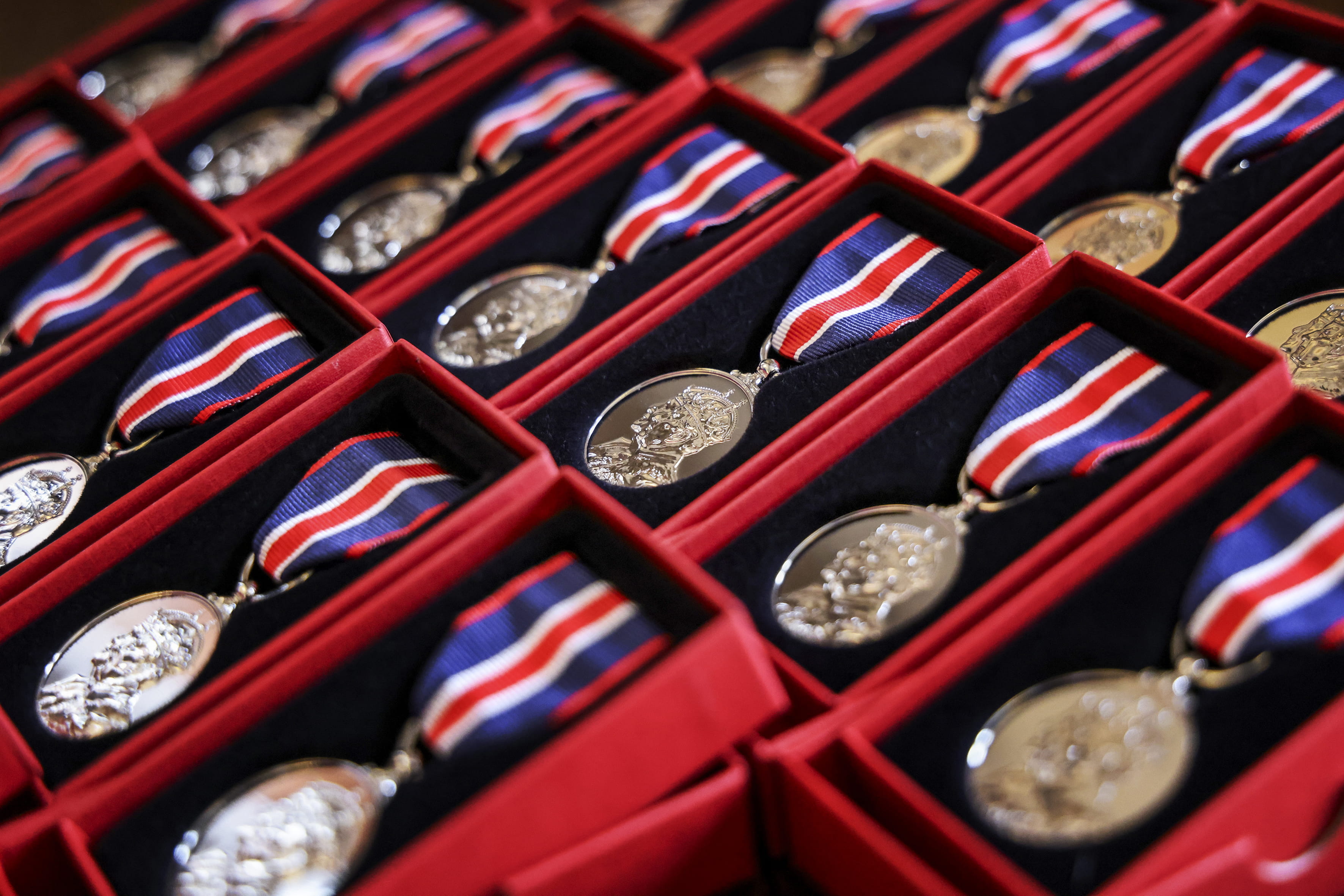 An array of Coronation Medals await presentation in their boxes