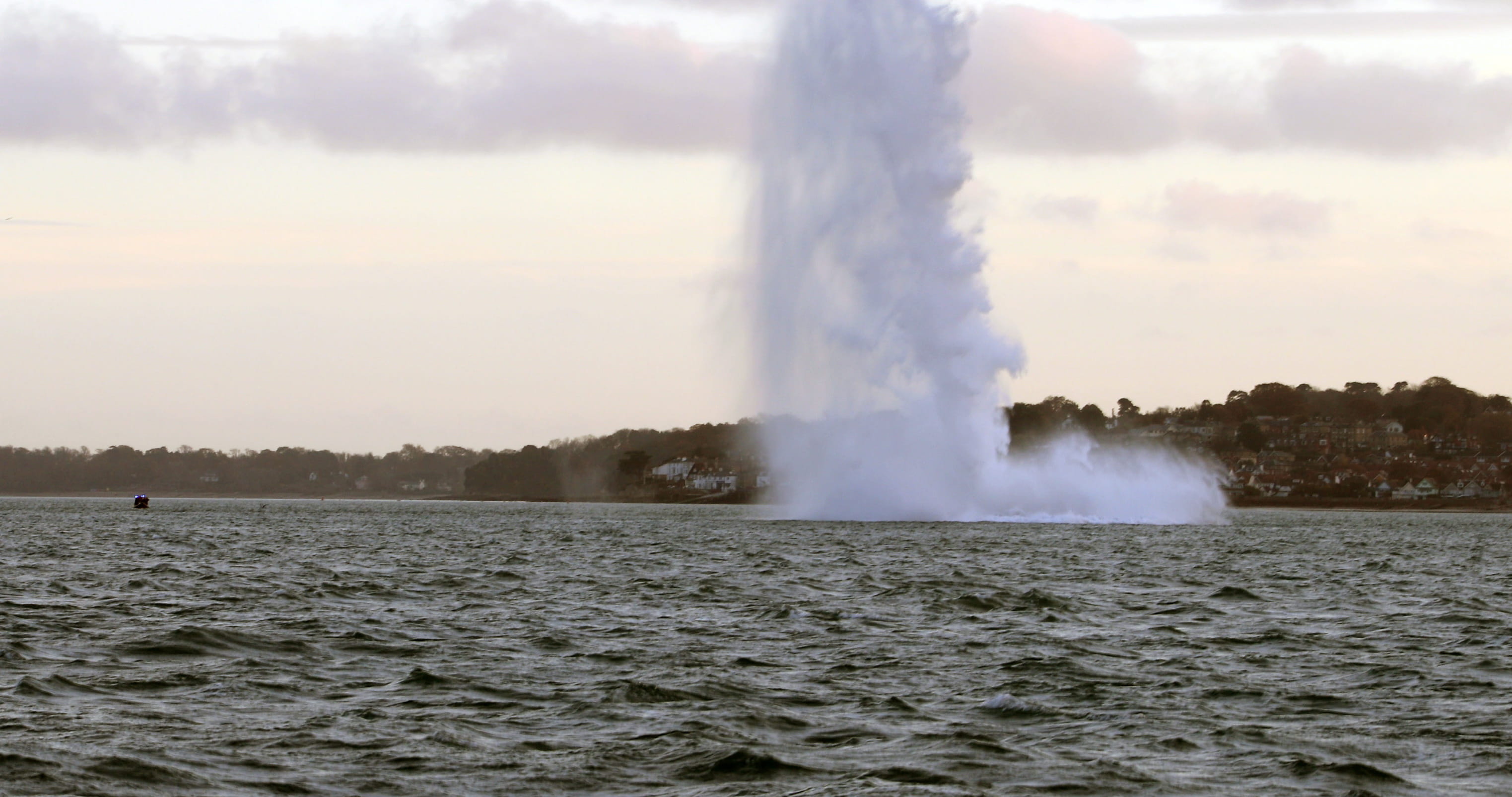 The bomb is detonated by Royal Navy divers