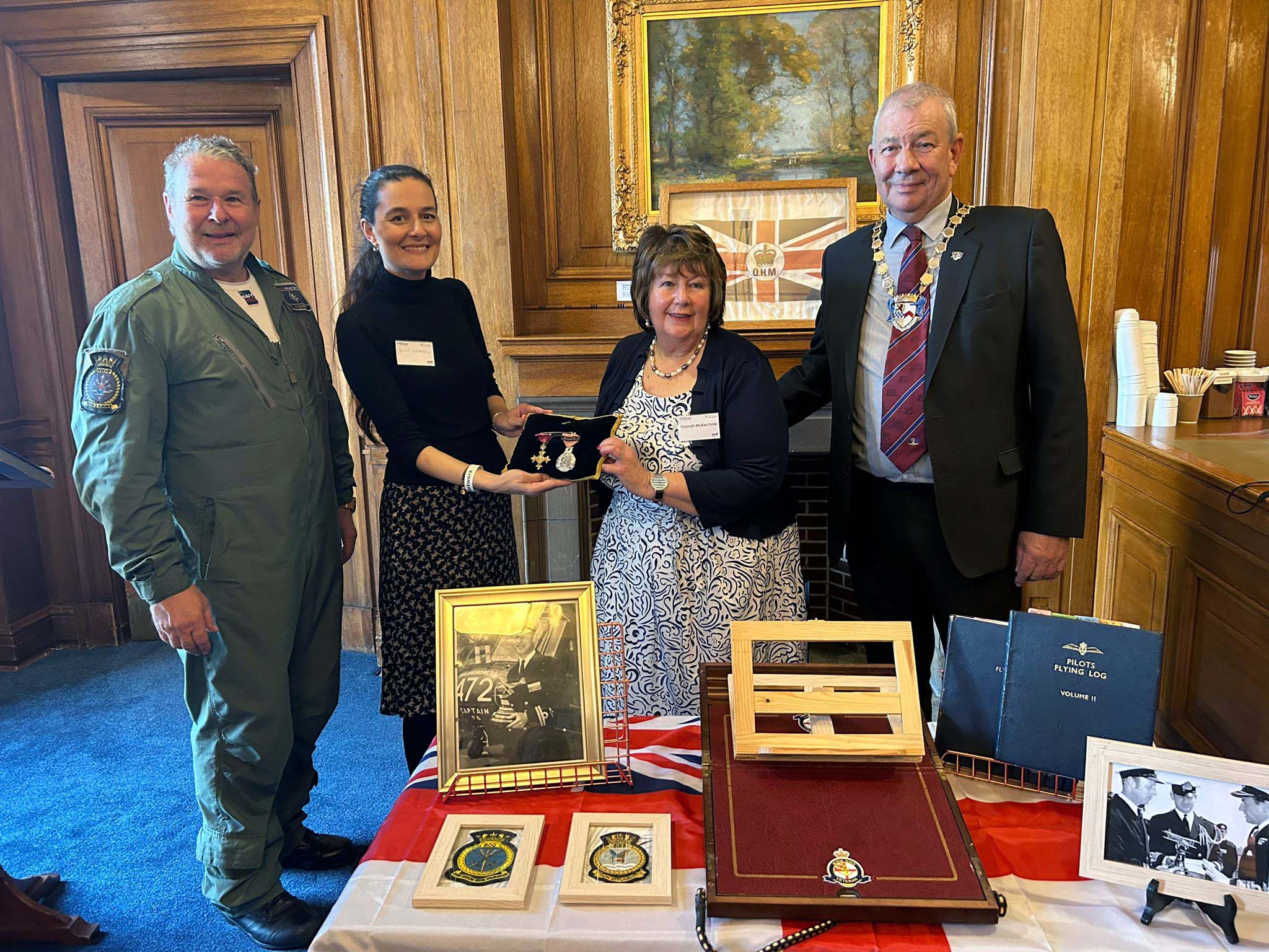 Presentation of Ian McKechnies medals citations logs and photographs