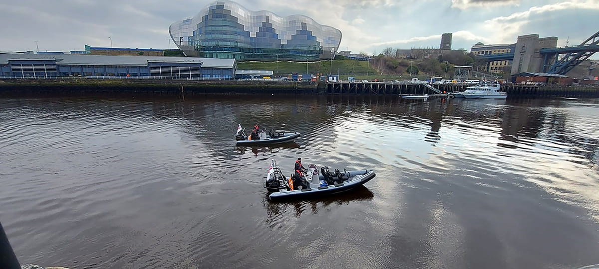 Looking over to Gateshead with HMS Example and Explorer alongside and the Sage Gateshead in the background