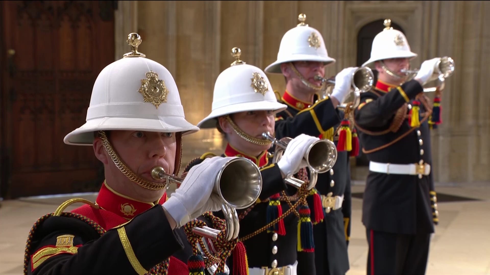 Royal Marines Buglers sound Action Stations during the funeral ceremony