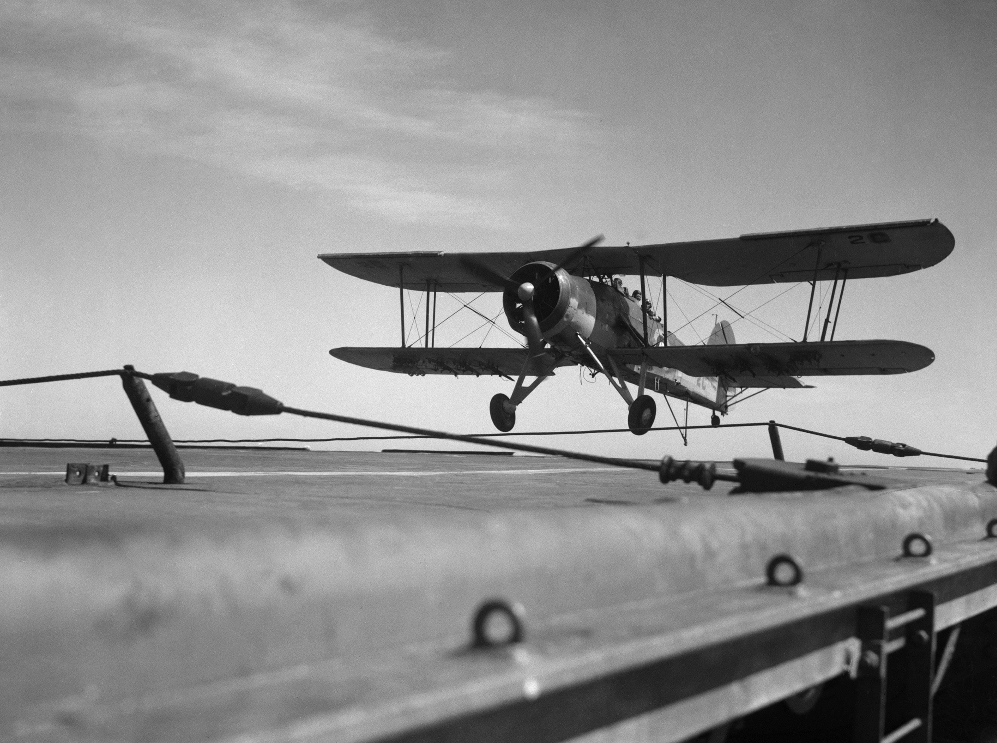 A Swordfish returns to the deck of a Royal Navy aircraft carrier after a sortie A Swordfish returns to the deck of a Royal Navy aircraft carrier after a sortie