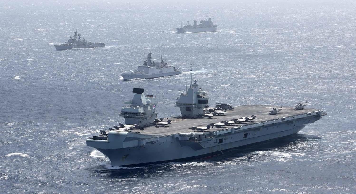 HMS Queen Elizabeth leads the Carrier Strike Group on exercises with the Indian Navy HMS Queen Elizabeth leads the Carrier Strike Group on exercises with the Indian Navy