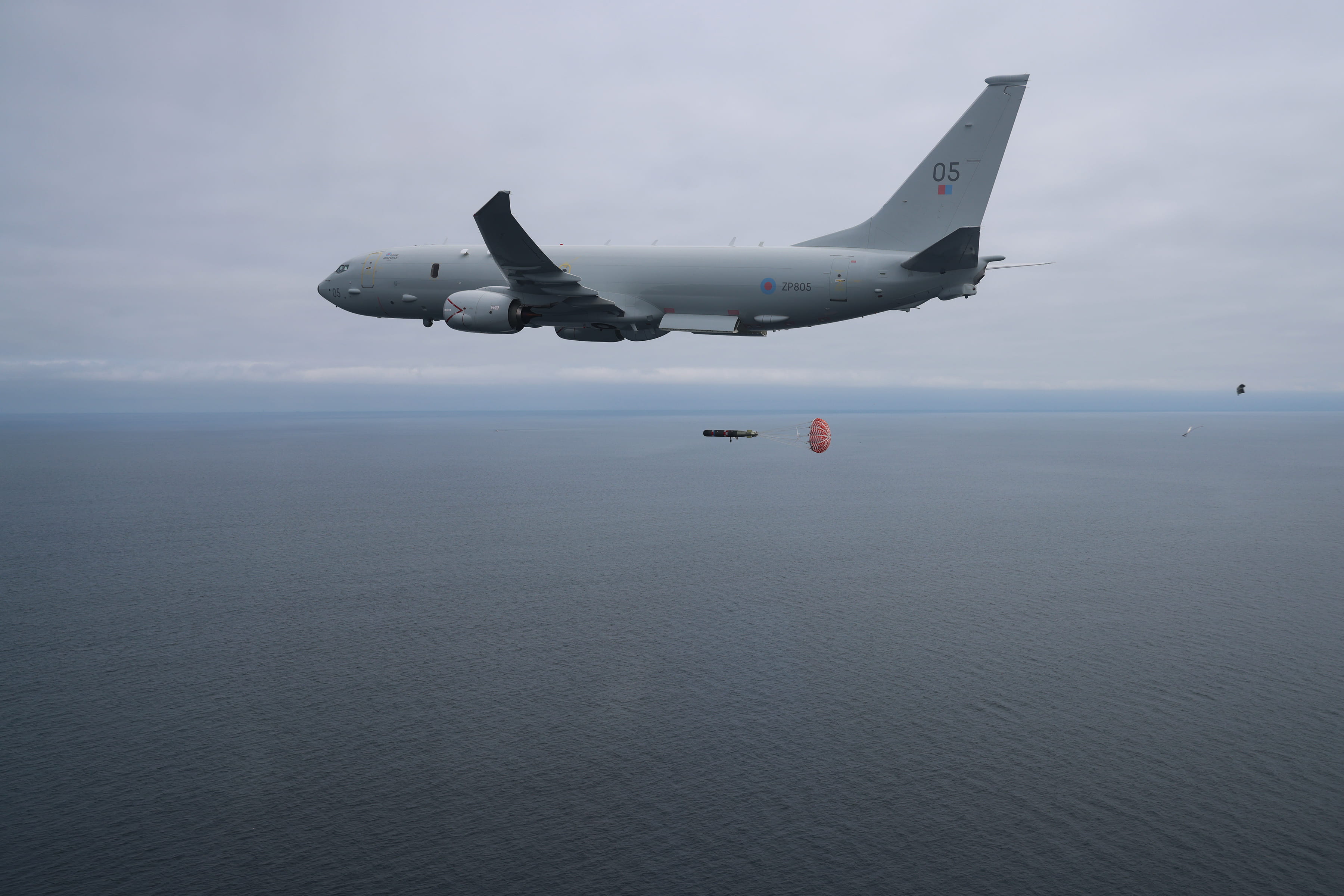 Torpedo away! The Mk56 drops from Fulmar with the drogue parachute deploying to slow its descent