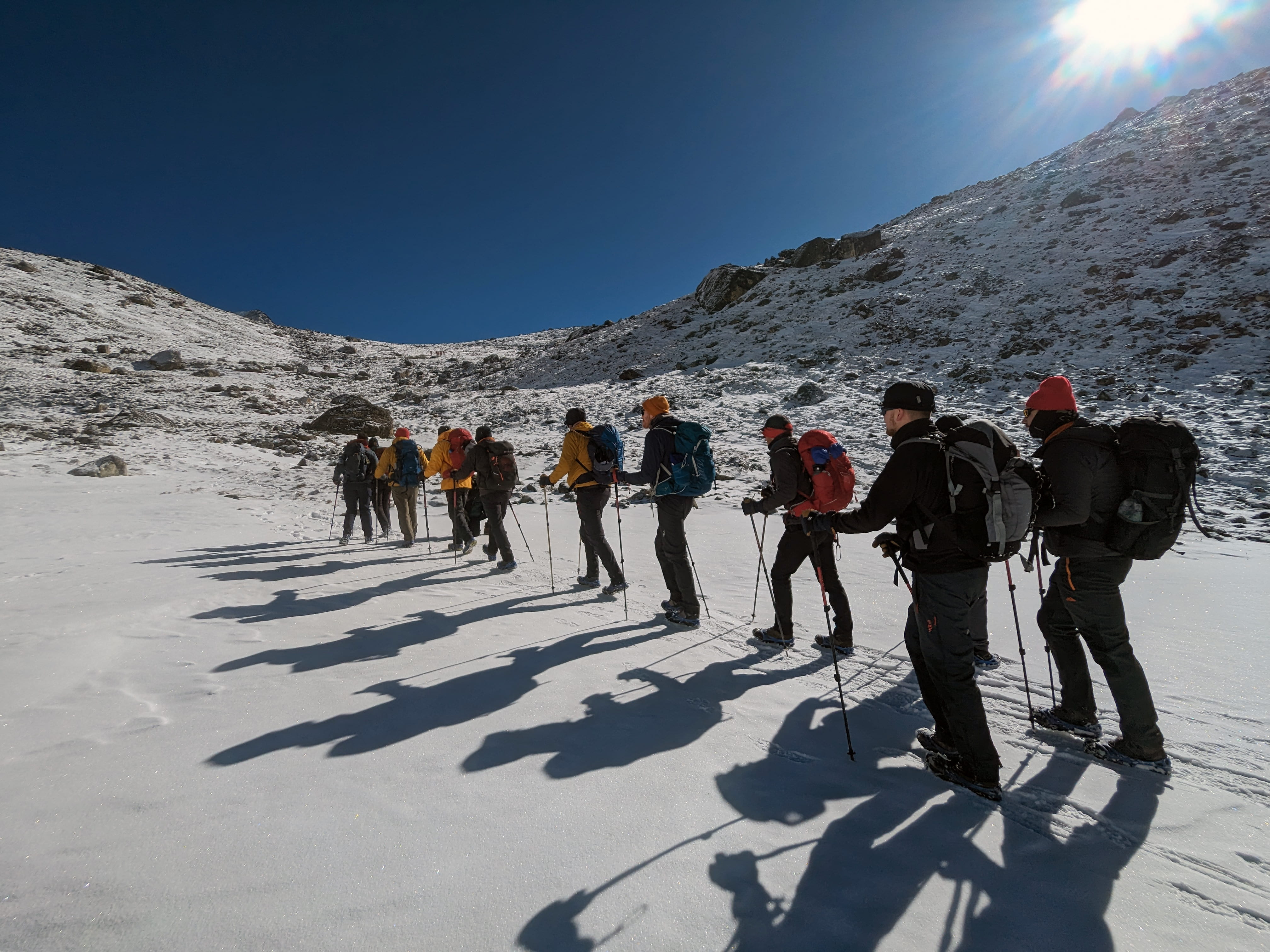 Trekking through snow to one of the passes