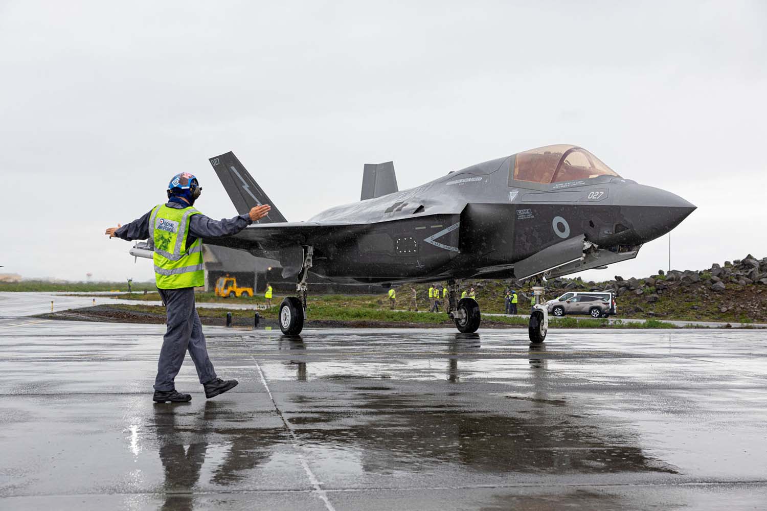 Picture of F35-B (ZM161) from RAF Marham taxiing in and directed by Ground Crew staff, due to conduct NATO air policing missions in Iceland.