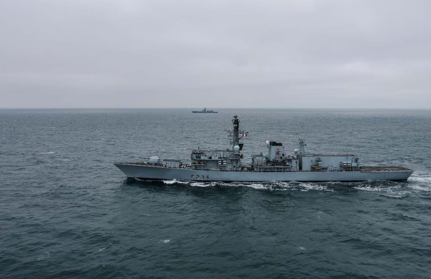 HMS Iron Duke (nearest camera) monitoring RFS Golovko in the English Channel