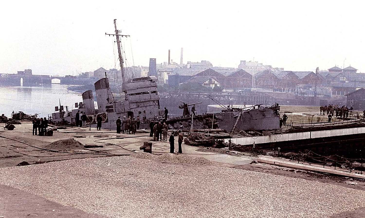 A rare colour image of HMS Campbeltown rammed into the dock gate