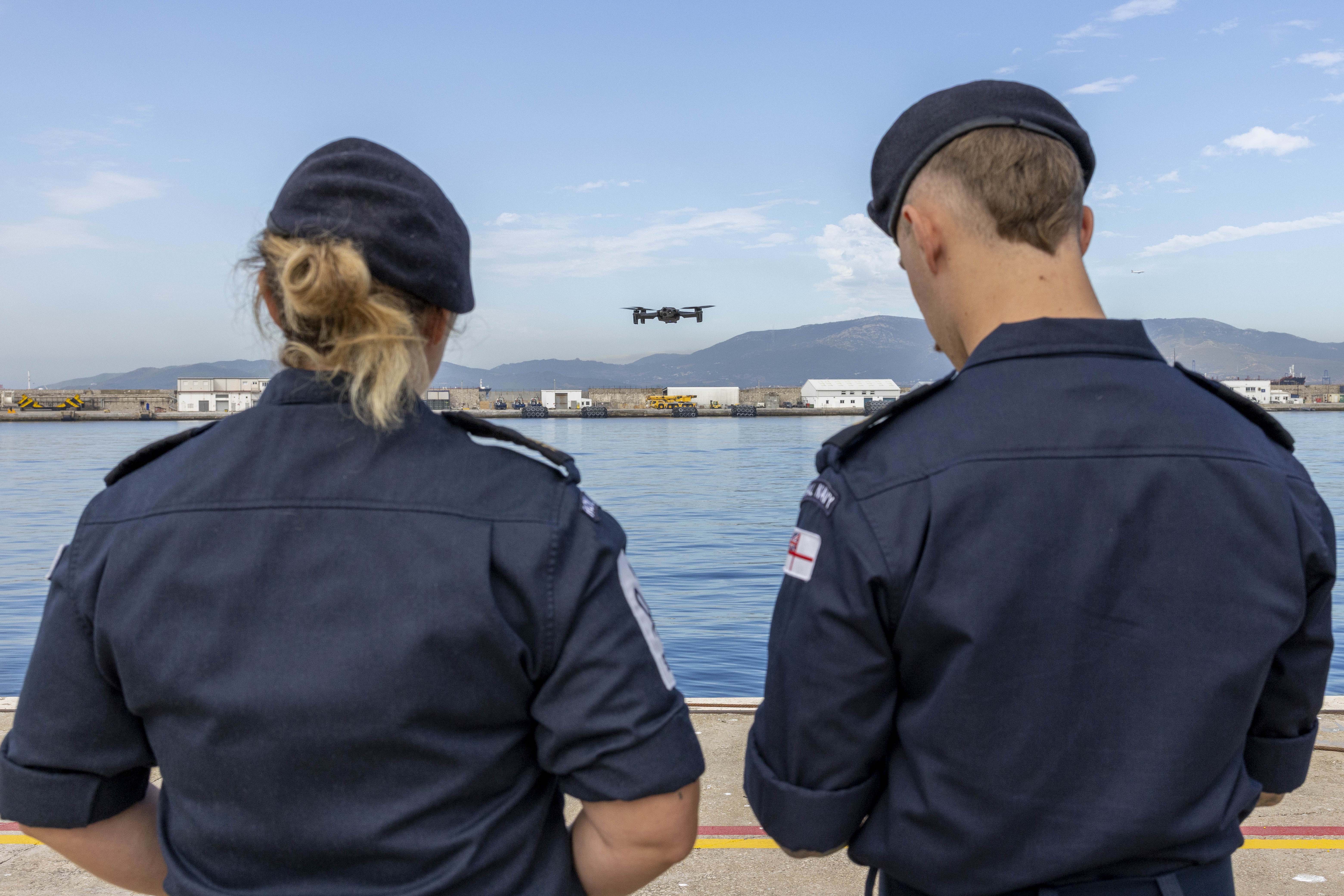 Pictured on 24 July 2025 are members of the Royal Navy Gibraltar Squadron (RNGS) flying a drone outside HMNB, Gibraltar. The UAV capability is new to the Sqn. 