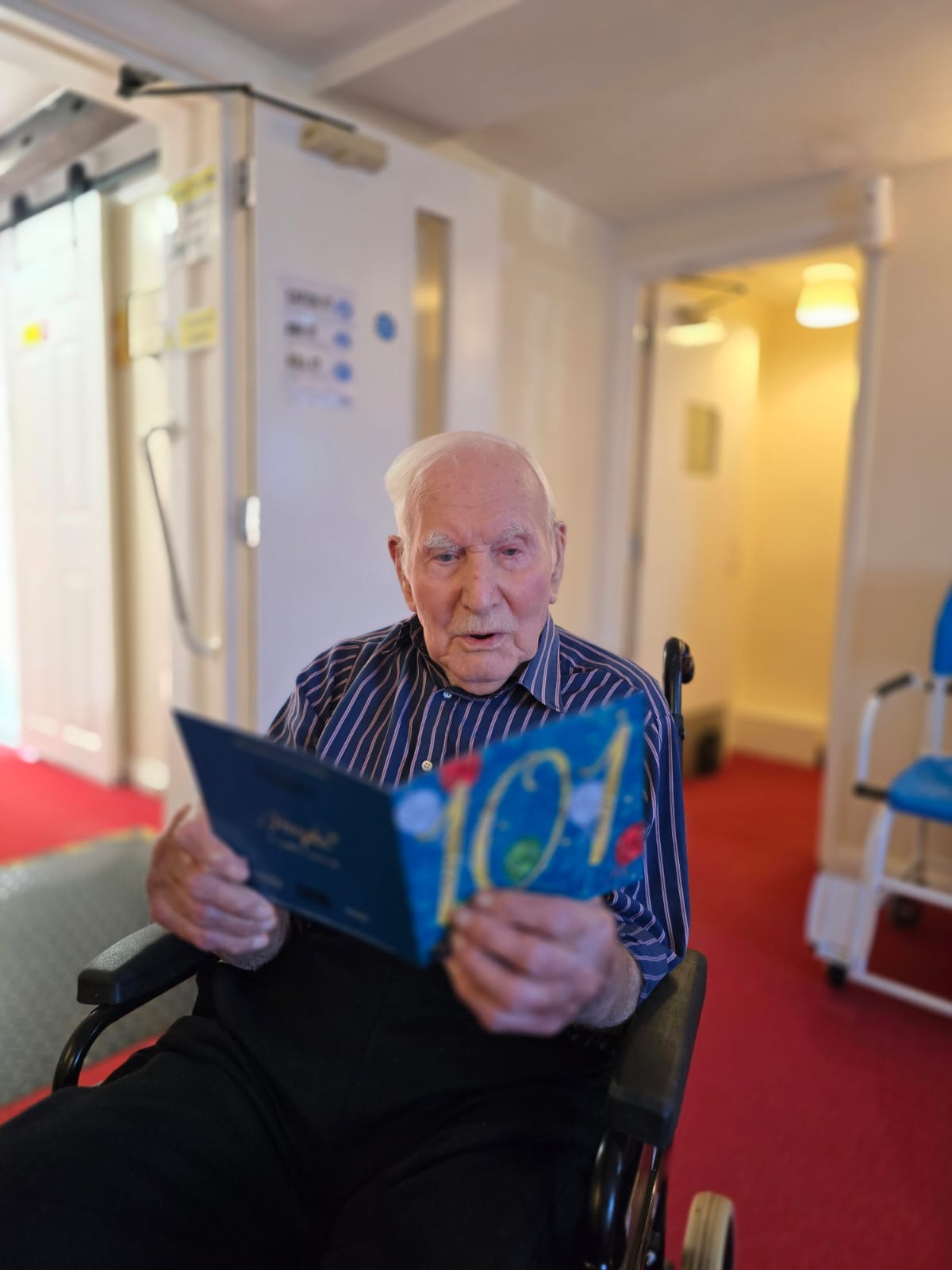 Ernie reads his card from the Ambassador in Moscow