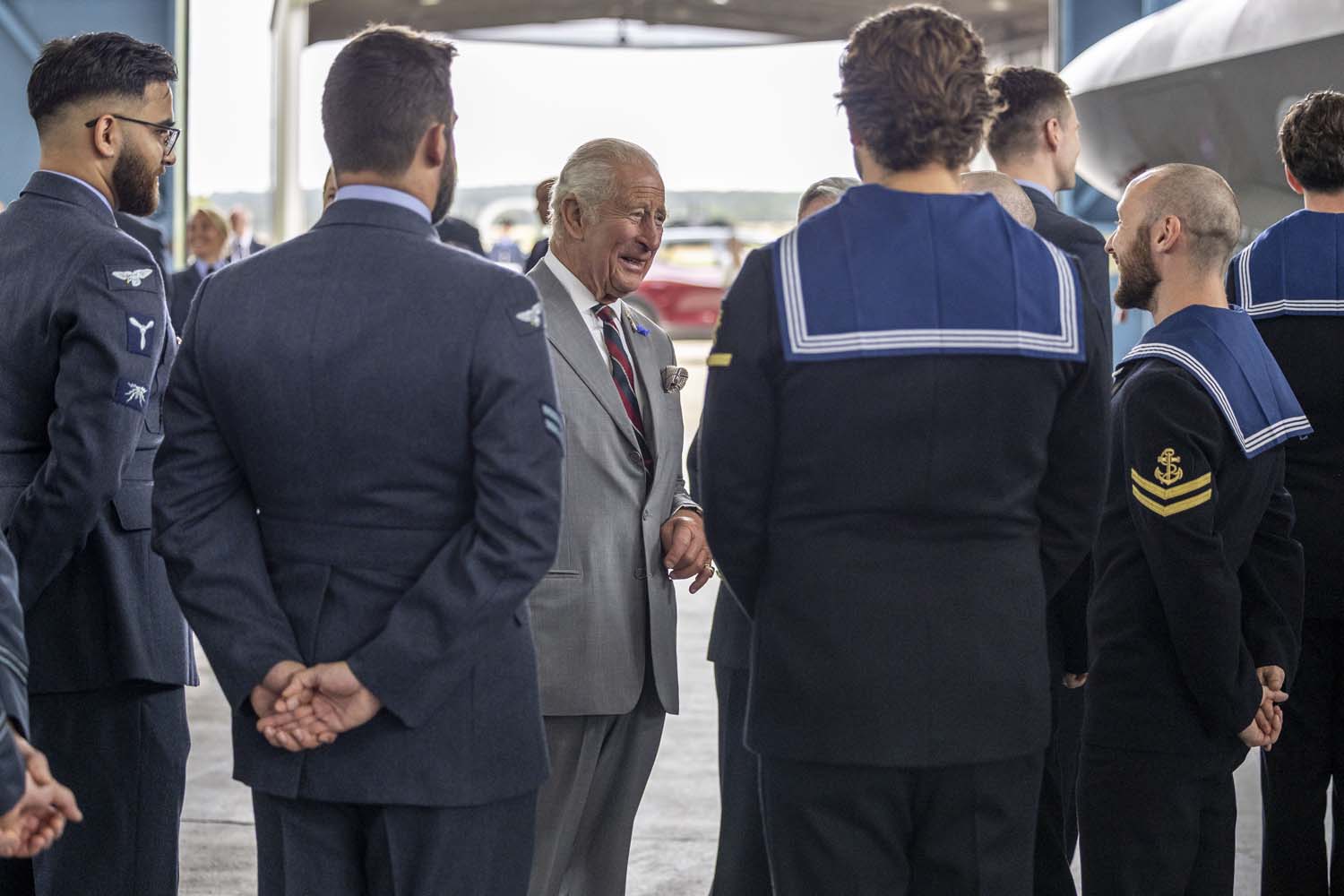 His Majesty The King meets Royal Navy personnel during visit to RAF Marham