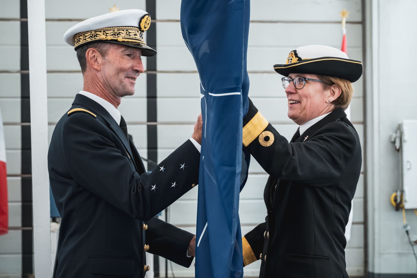Commodore Maryla Ingham hands over to Rear Admiral Nicolas Molitor