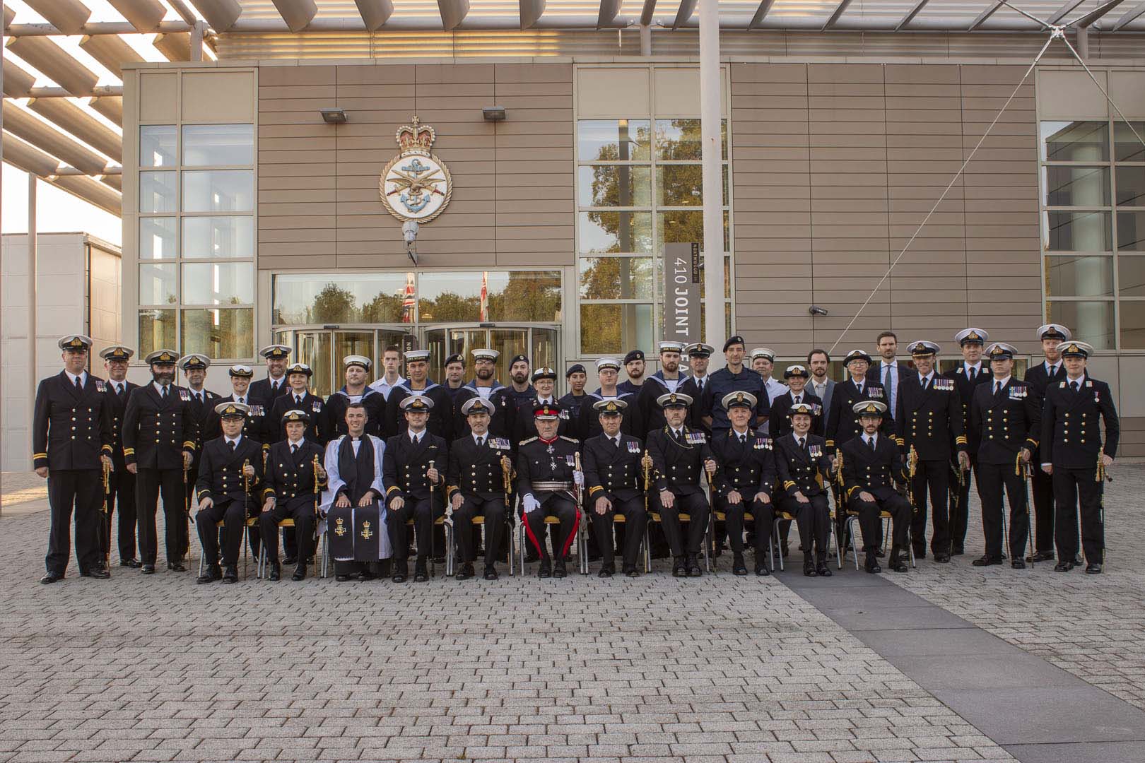 Wildfire personnel pose for an anniversary group shot