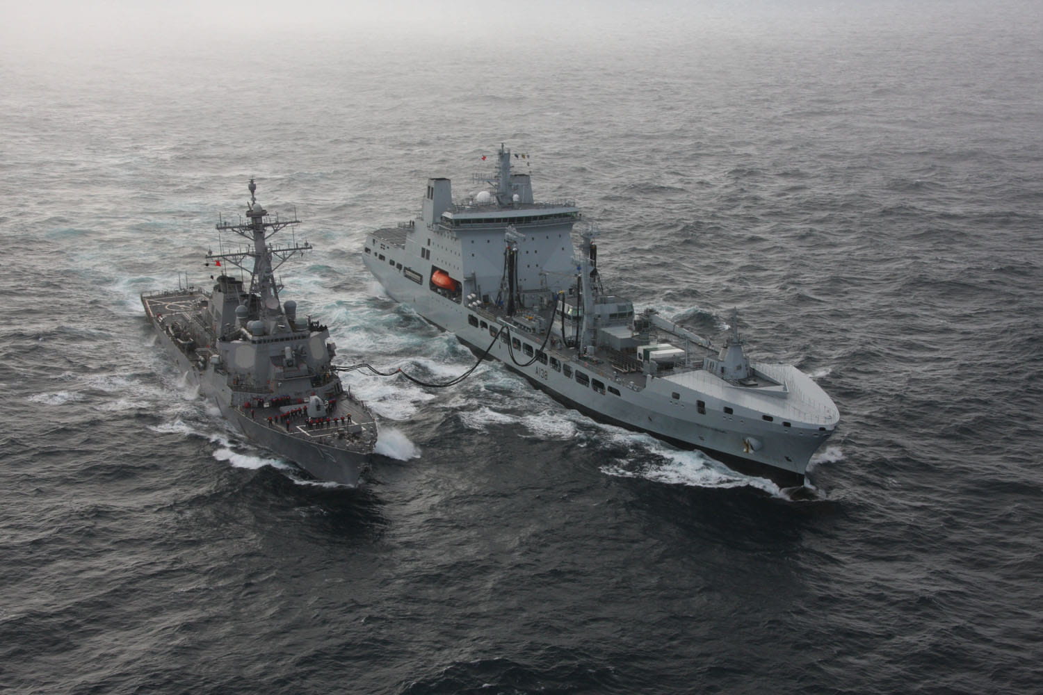 RFA Tidesurge replenishes US destroyer