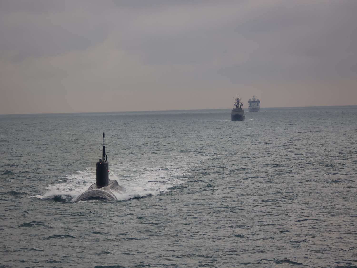 RFA Tidesurge tracks a Russian submarine and tugboat