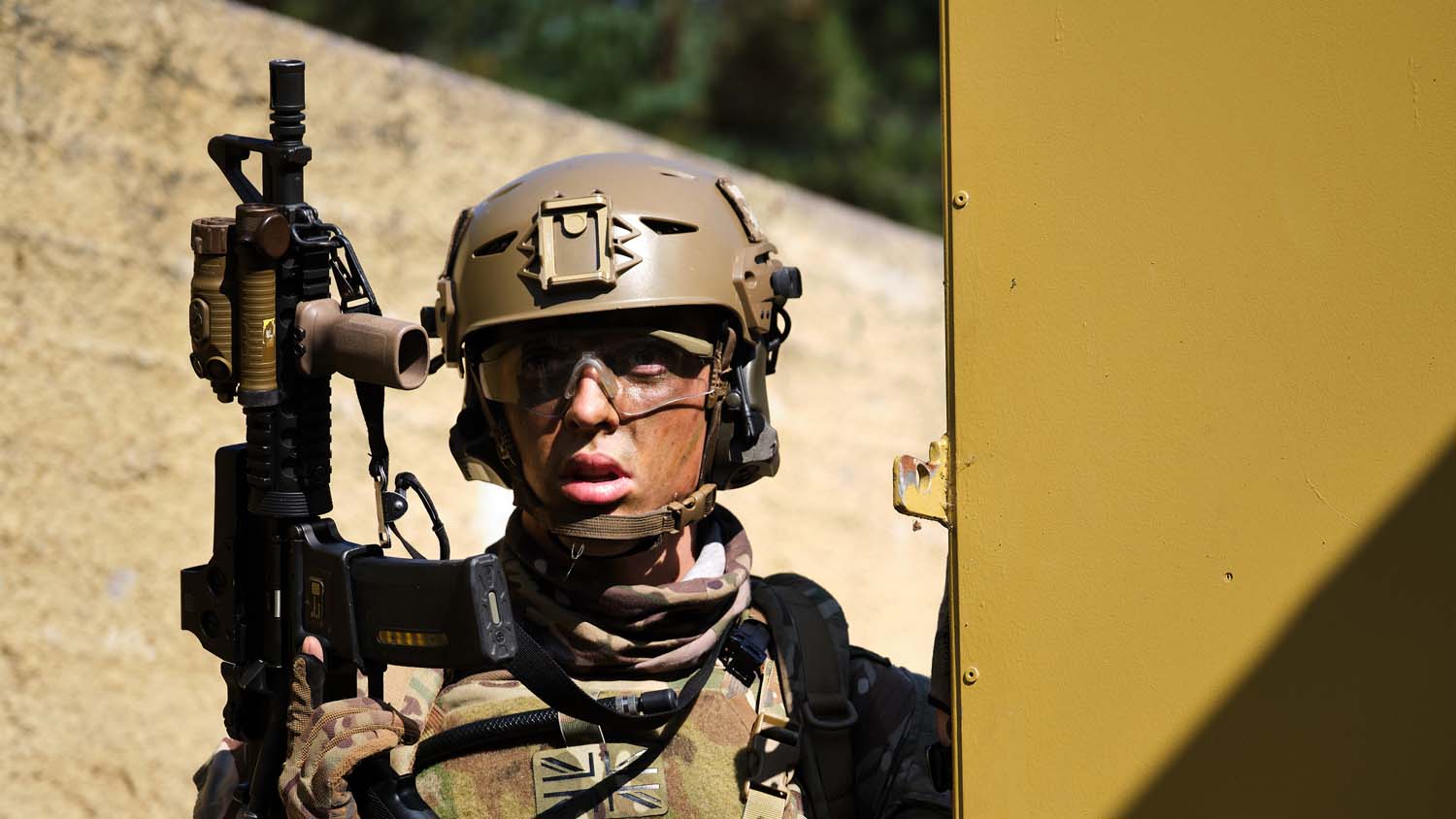 Royal Marines raid a compound held by terrorists during the final phase of their eight-week boarding course