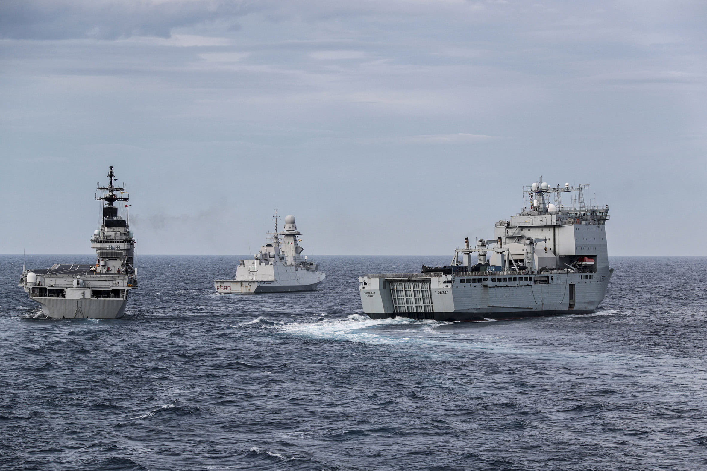 The Italian carrier ITS Giuseppe Garibaldi, frigate ITS Carlo Bergamini and RFA Lyme Bay manoeuvre in close formation The Italian carrier ITS Giuseppe Garibaldi, frigate ITS Carlo Bergamini and RFA Lyme Bay manoeuvre in close formation