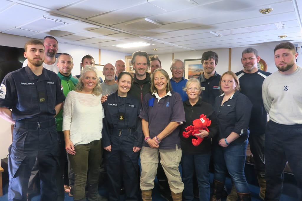 The crew of the Clyde Challenger with members of HMS Dragon's ship's company who were involved in the rescue