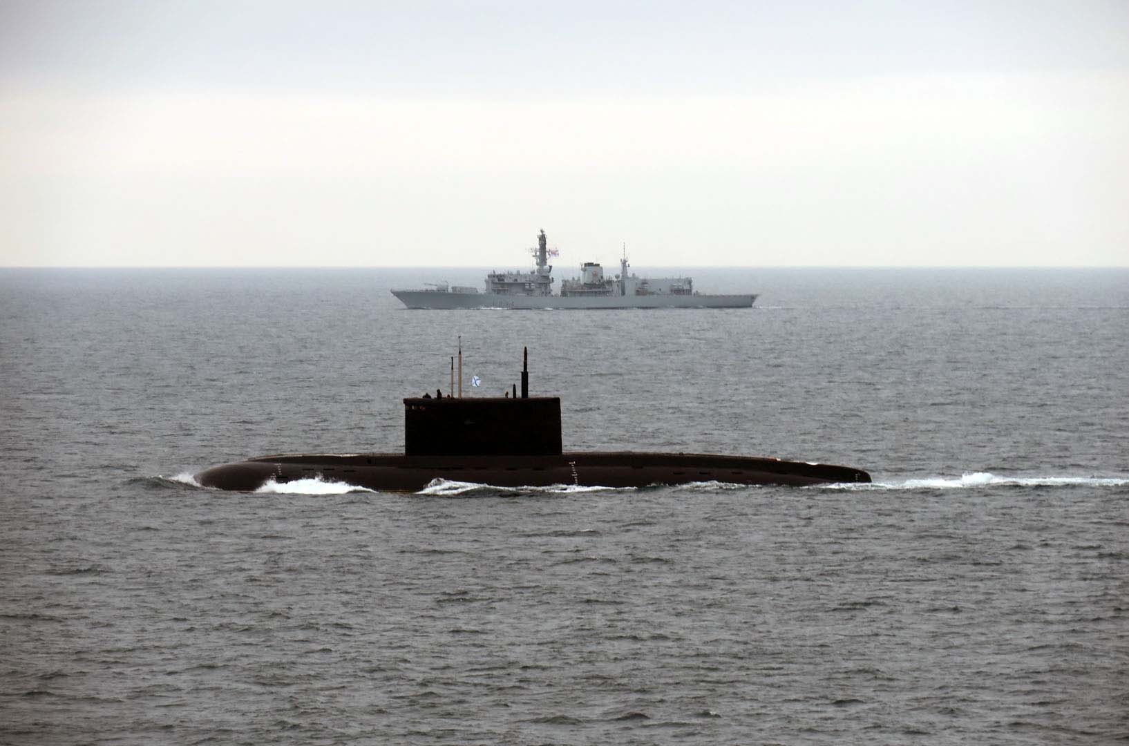 Kilo foreground - HMS Iron Duke in the background