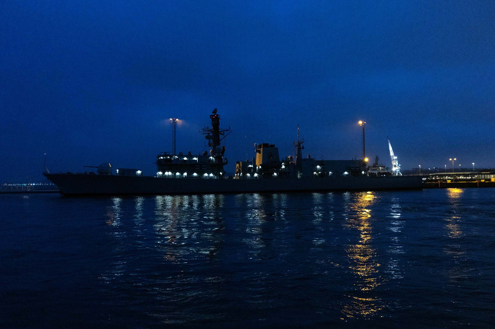 HMS Iron Duke lit up at night in Tallinn Naval Base - courtesy of Estonian Armed Forces