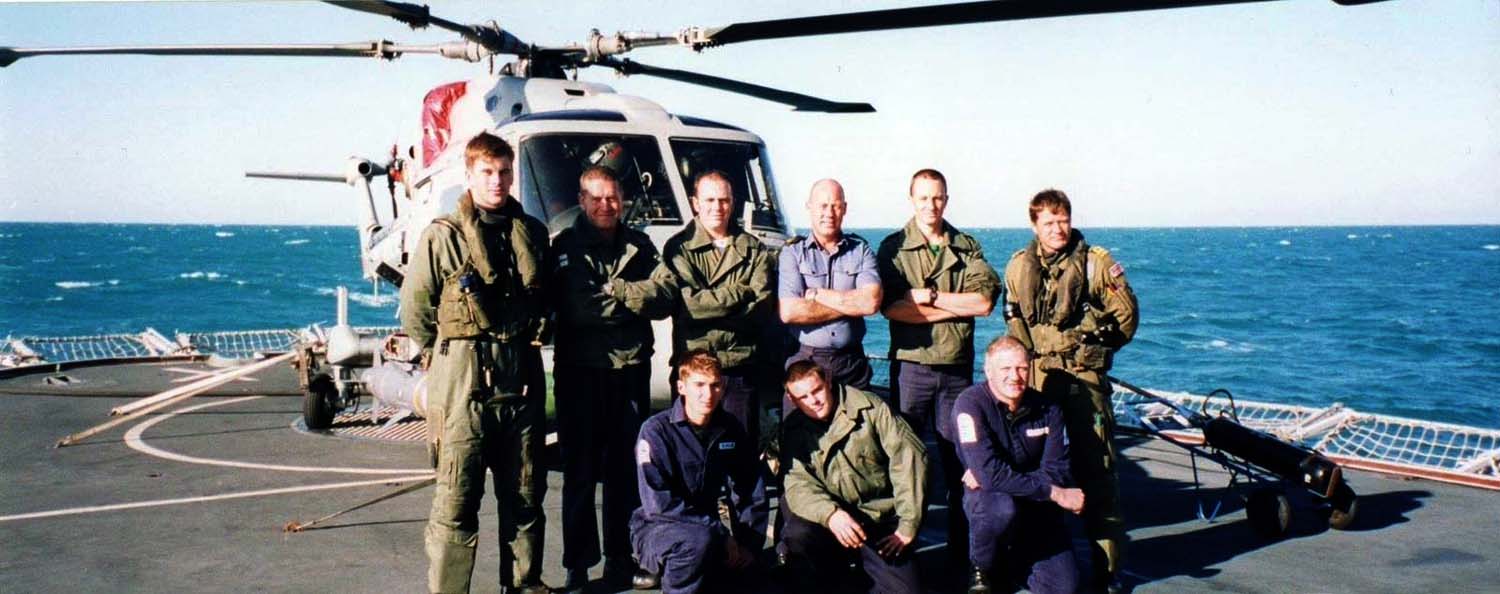 Like fathers, like sons – Navy helicopter engineers recreate photos 26 years apart   