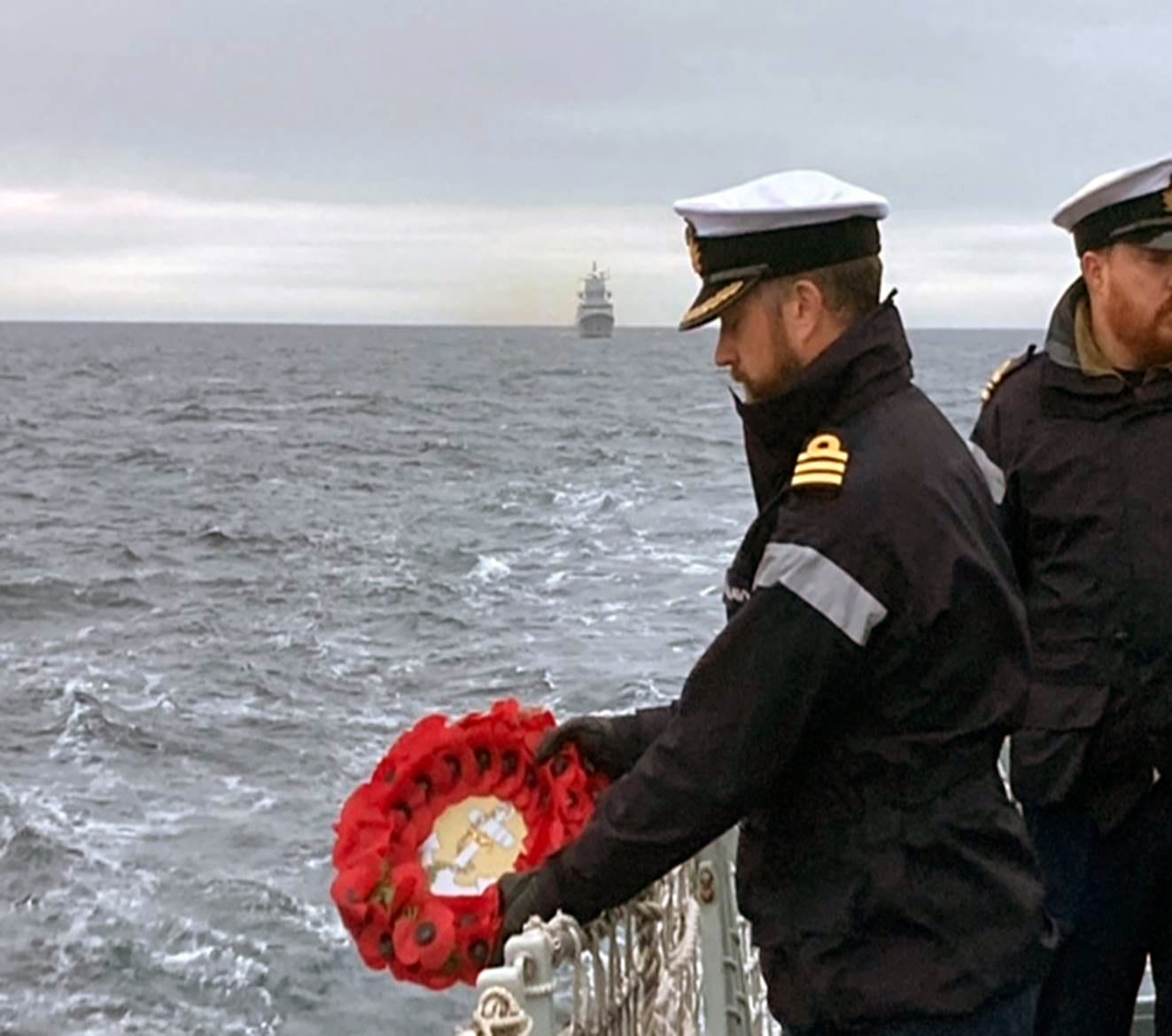 Commander Will Blackett prepares to lay a wreath in the Norwegian Sea Commander Will Blackett prepares to lay a wreath in the Norwegian Sea