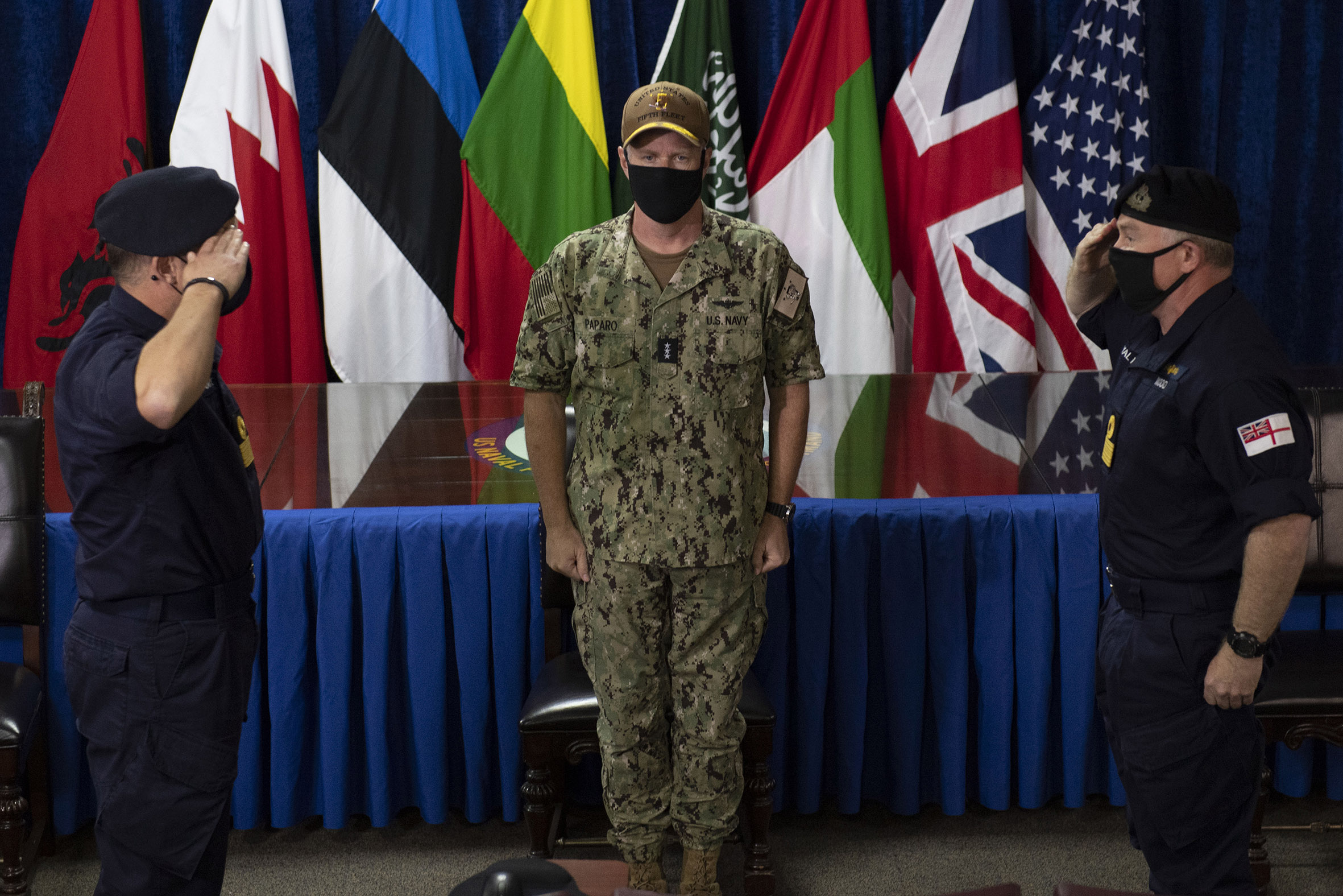 Outgoing Sentinel Commander Cdre Craig Wood (right) salutes his successor Cdre Adrian Fryer watched by US Navy Vice Admiral Samuel Paparo Outgoing Sentinel Commander Cdre Craig Wood (right) salutes his successor Cdre Adrian Fryer watched by US Navy Vice Admiral Samuel Paparo