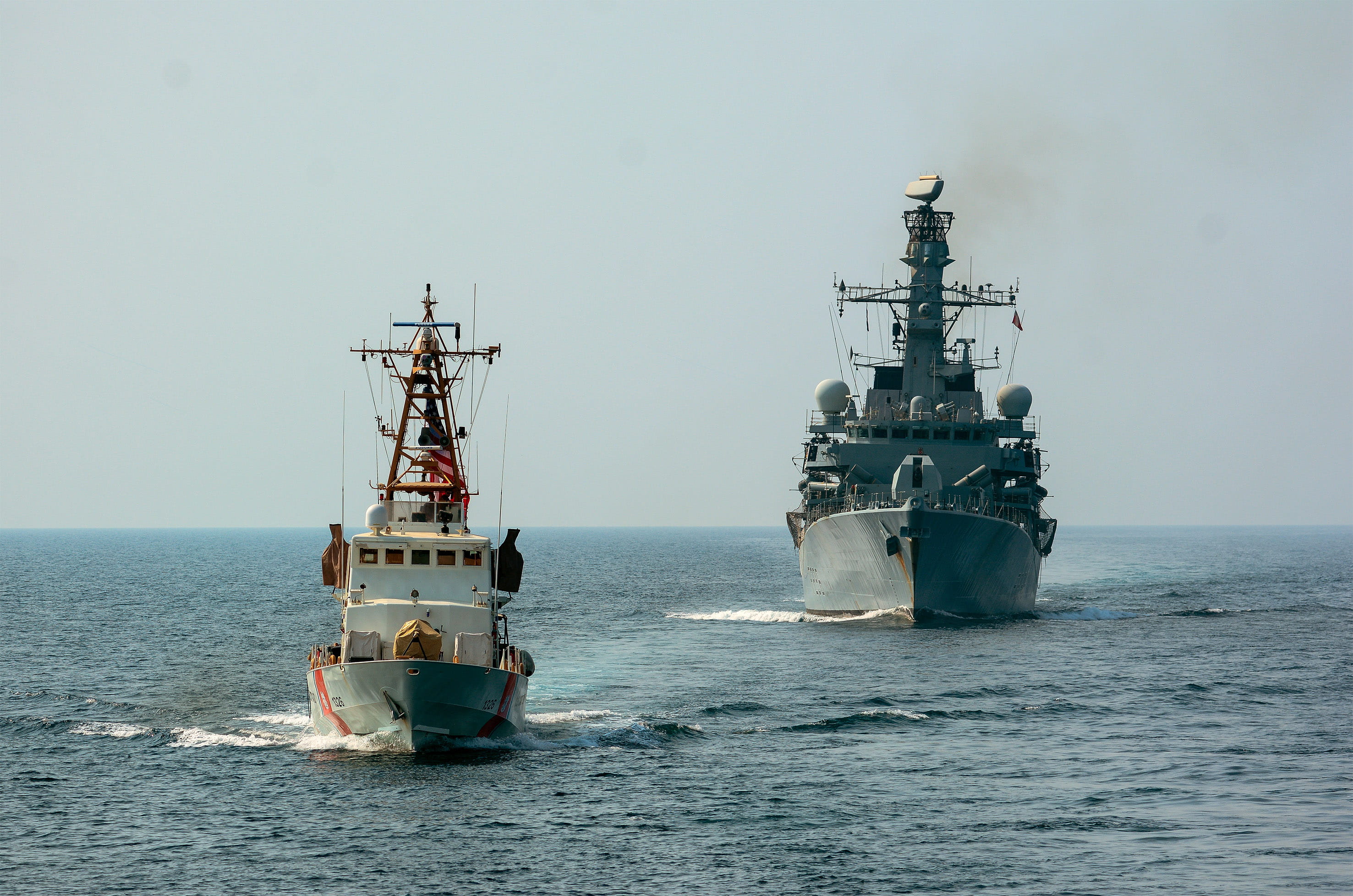 A USCG patrol boat leads HMS Montrose during a joint patrol.jpg A USCG patrol boat leads HMS Montrose during a joint patrol.jpg