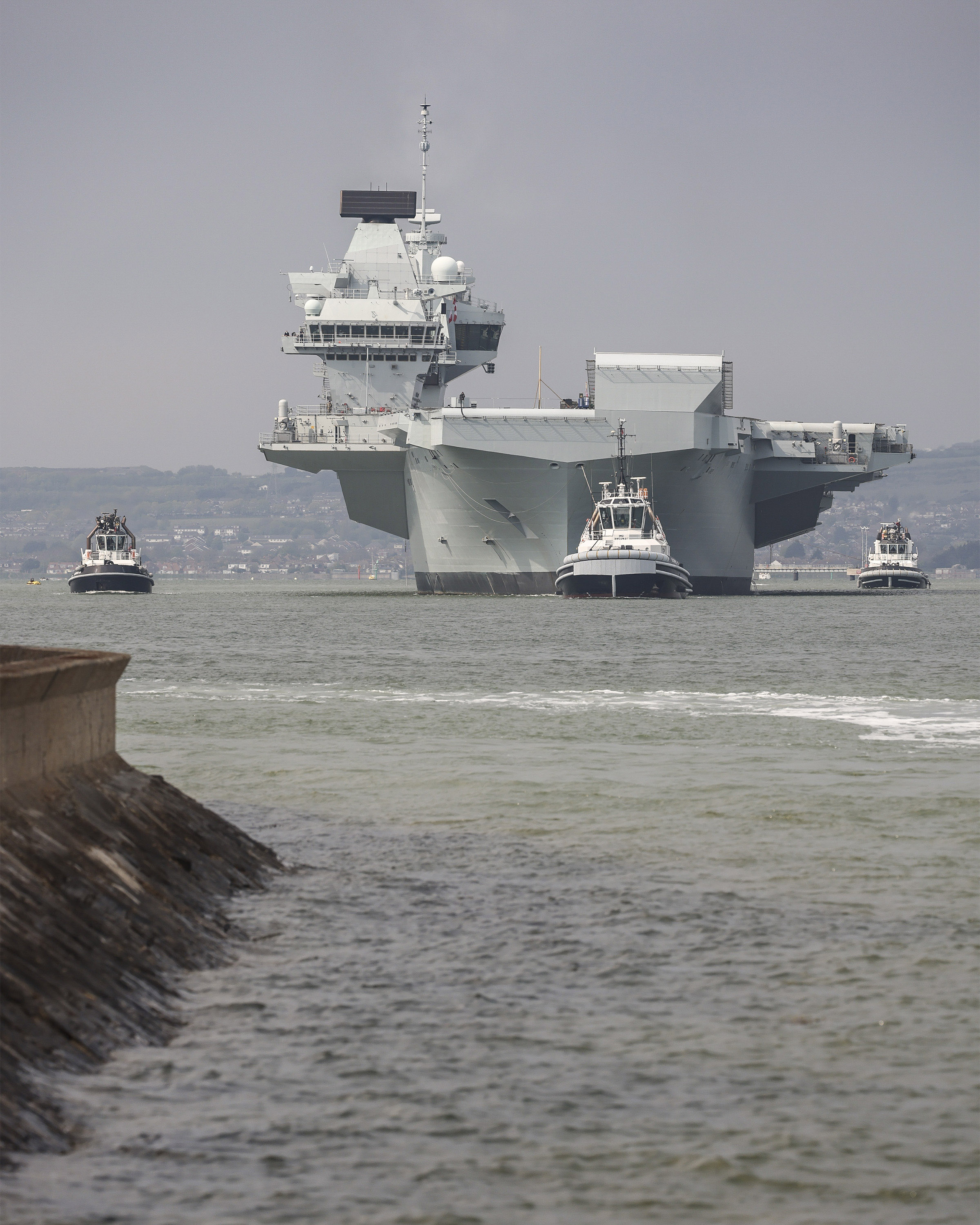 Tugs assist HMS Prince of Wales out harbour Tugs assist HMS Prince of Wales out harbour