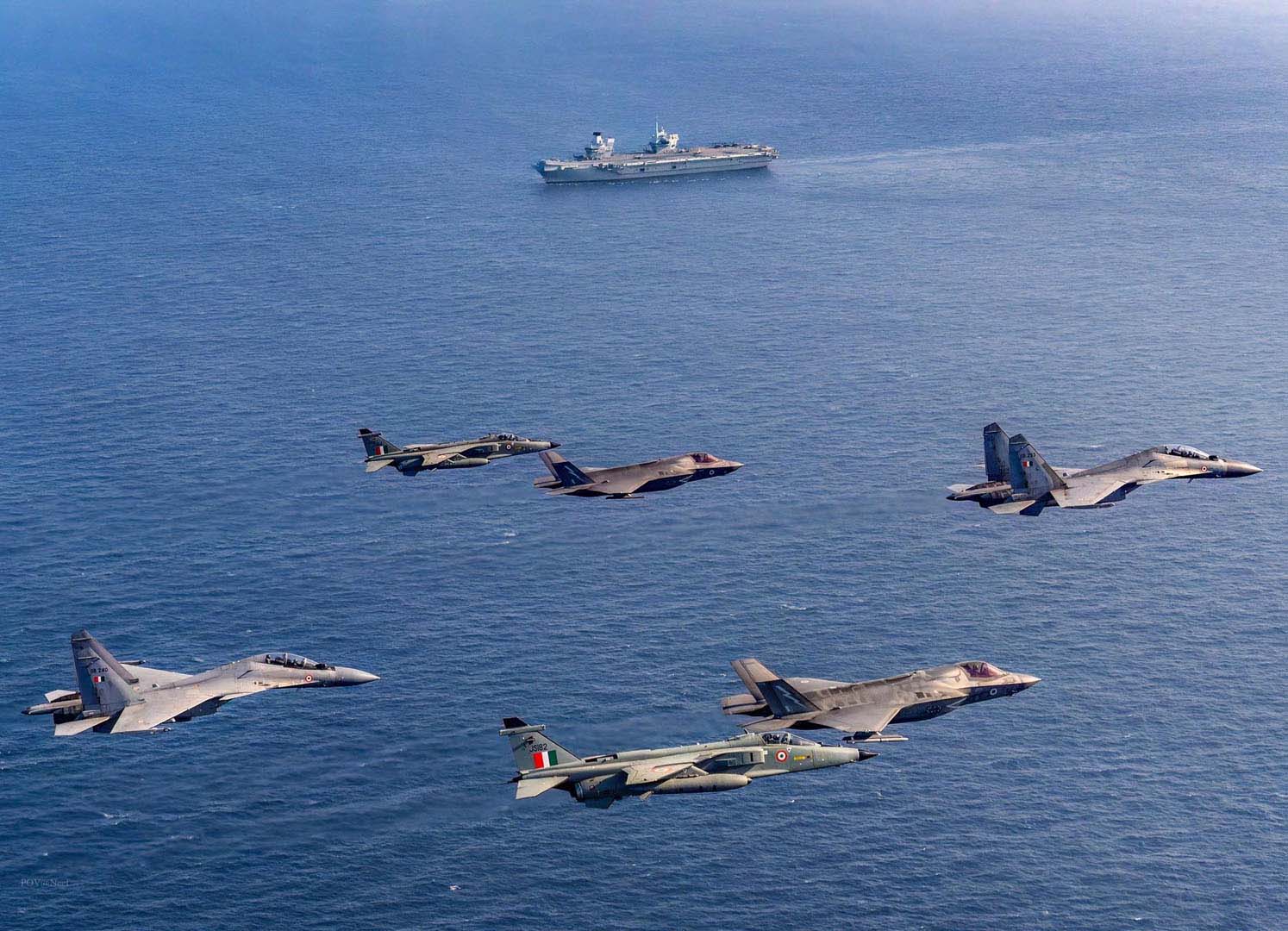 2 Indian Air Force Su27s and 2 Jaguars plus two UK F-35Bs fly past HMS Prince of Wales